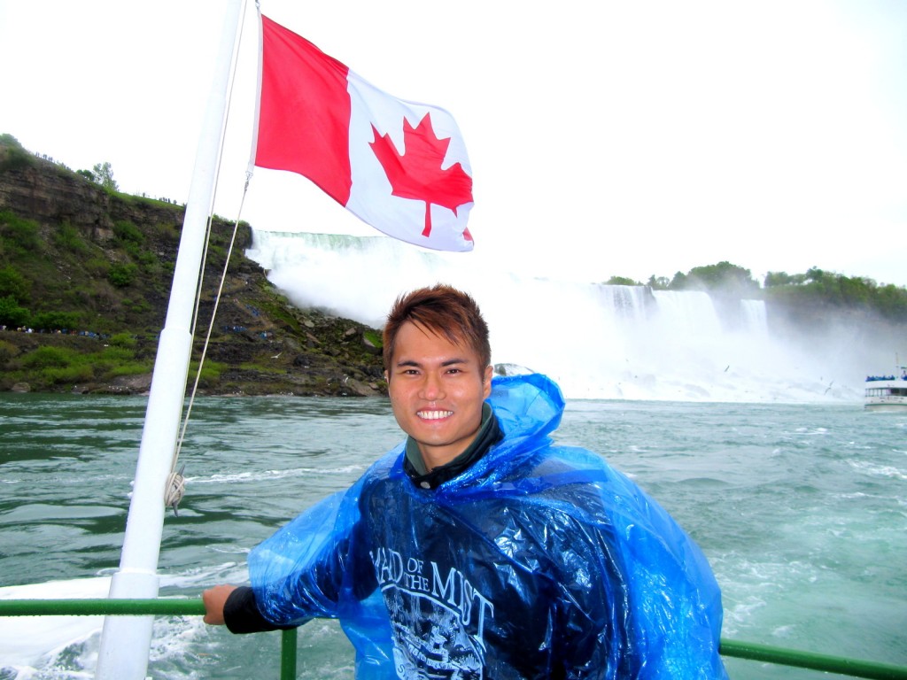 With American Falls and Canadian Flag