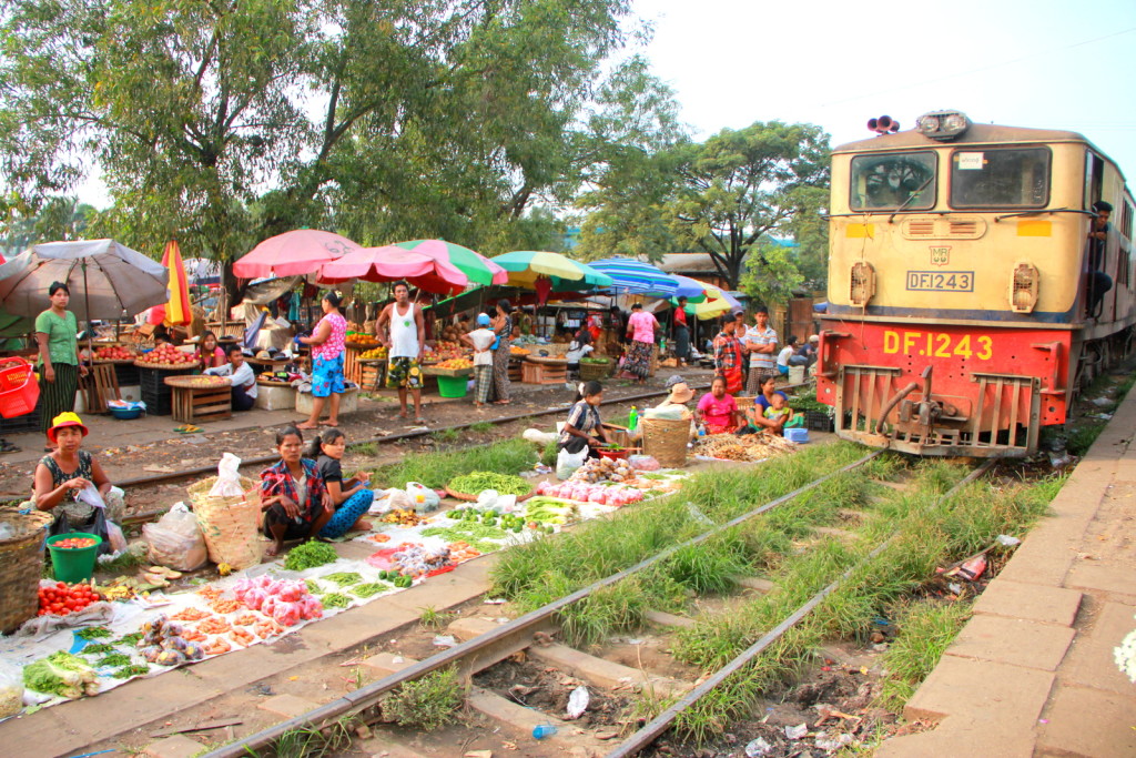 The fascinating local vendor next to the train